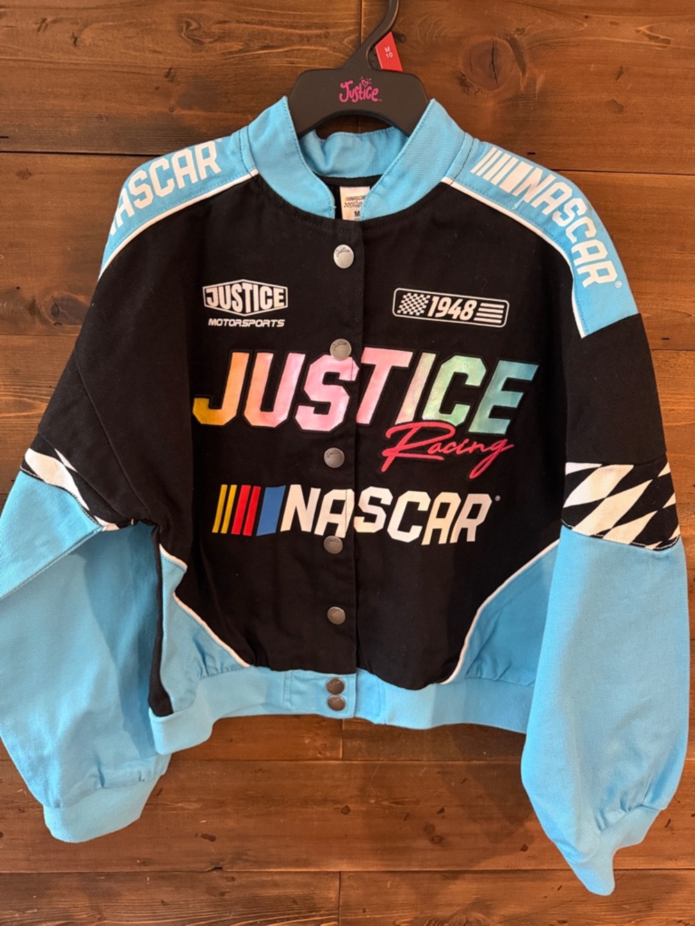 Justice NASCAR Black Jacket with Light Blue Trim and Multicolor Logo